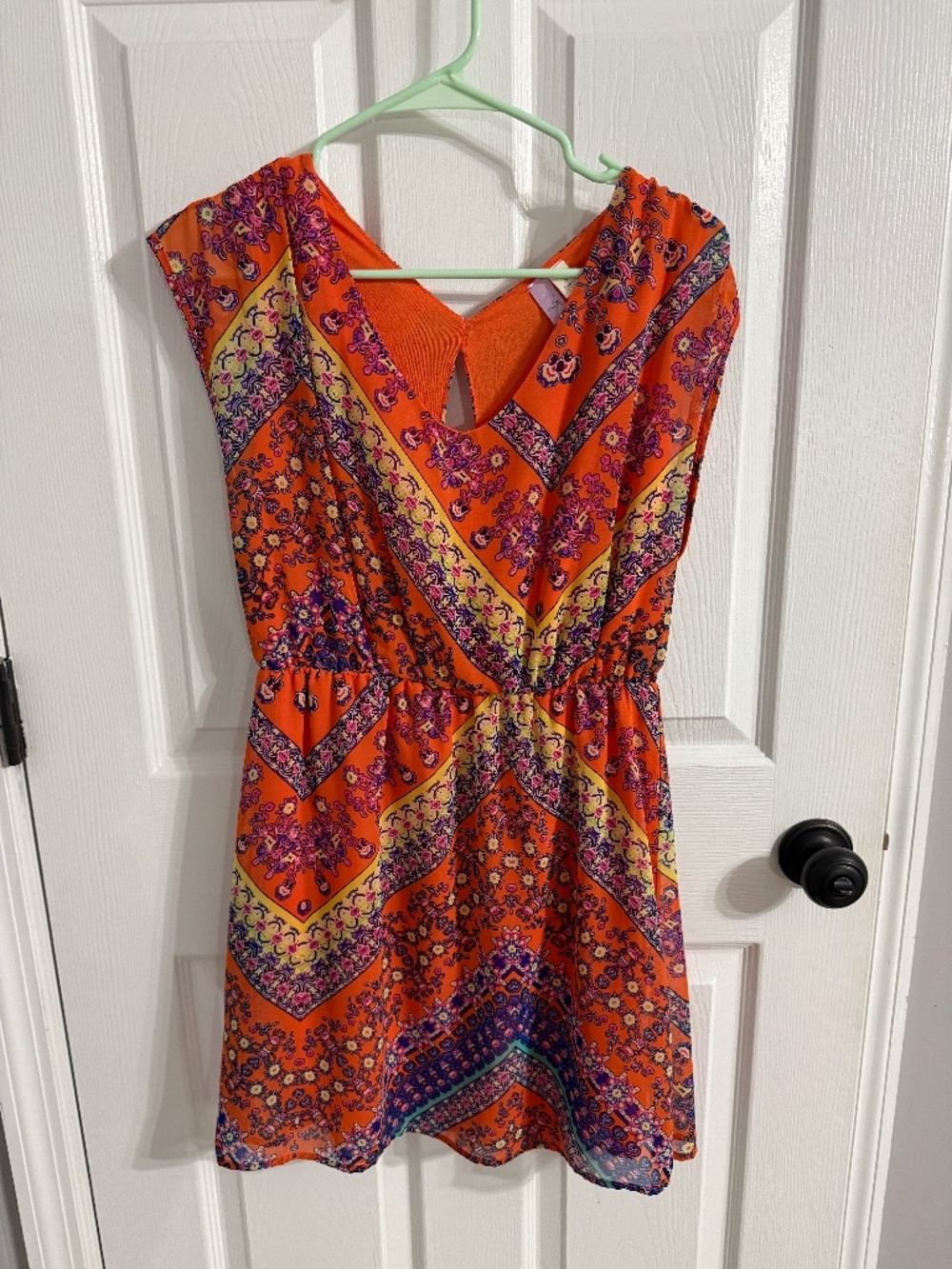 Orange pattern mini dress